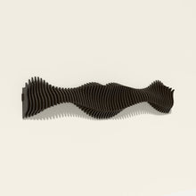 Anomaly II wood wall sculpture in black stain, side angle