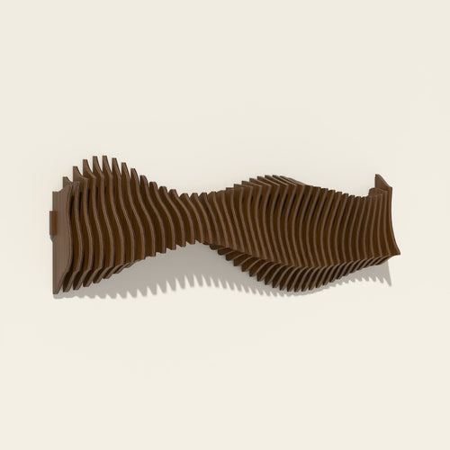 Anomaly wall sculpture, birch hand-stained in a walnut tone, seen from the side