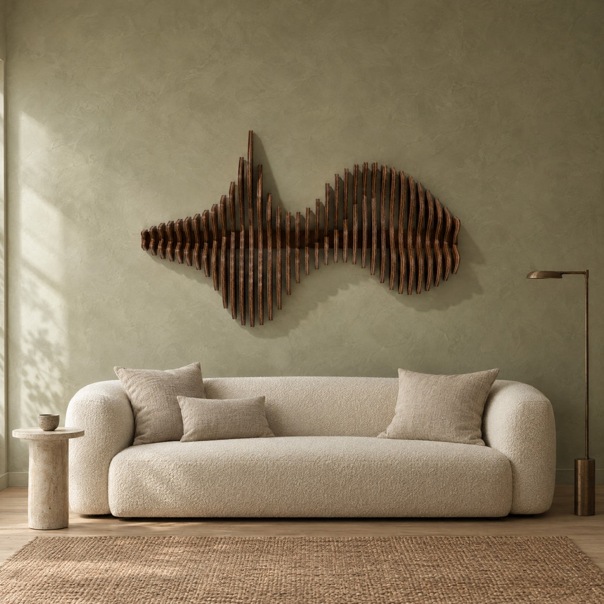 Convergence in walnut stain above a cream bouclé sofa in a sage plaster living room