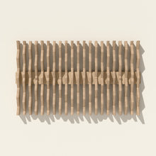 Equinox wall sculpture in natural birch