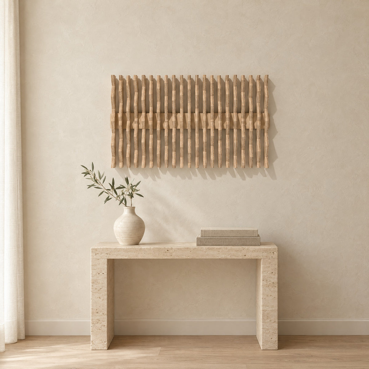 Equinox in natural birch above a travertine console in an ivory limewash living room