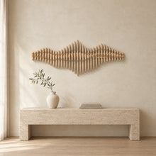 Liminal in natural birch above a travertine console in an ivory limewash living room