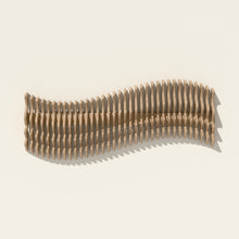 Meander wall sculpture in natural birch