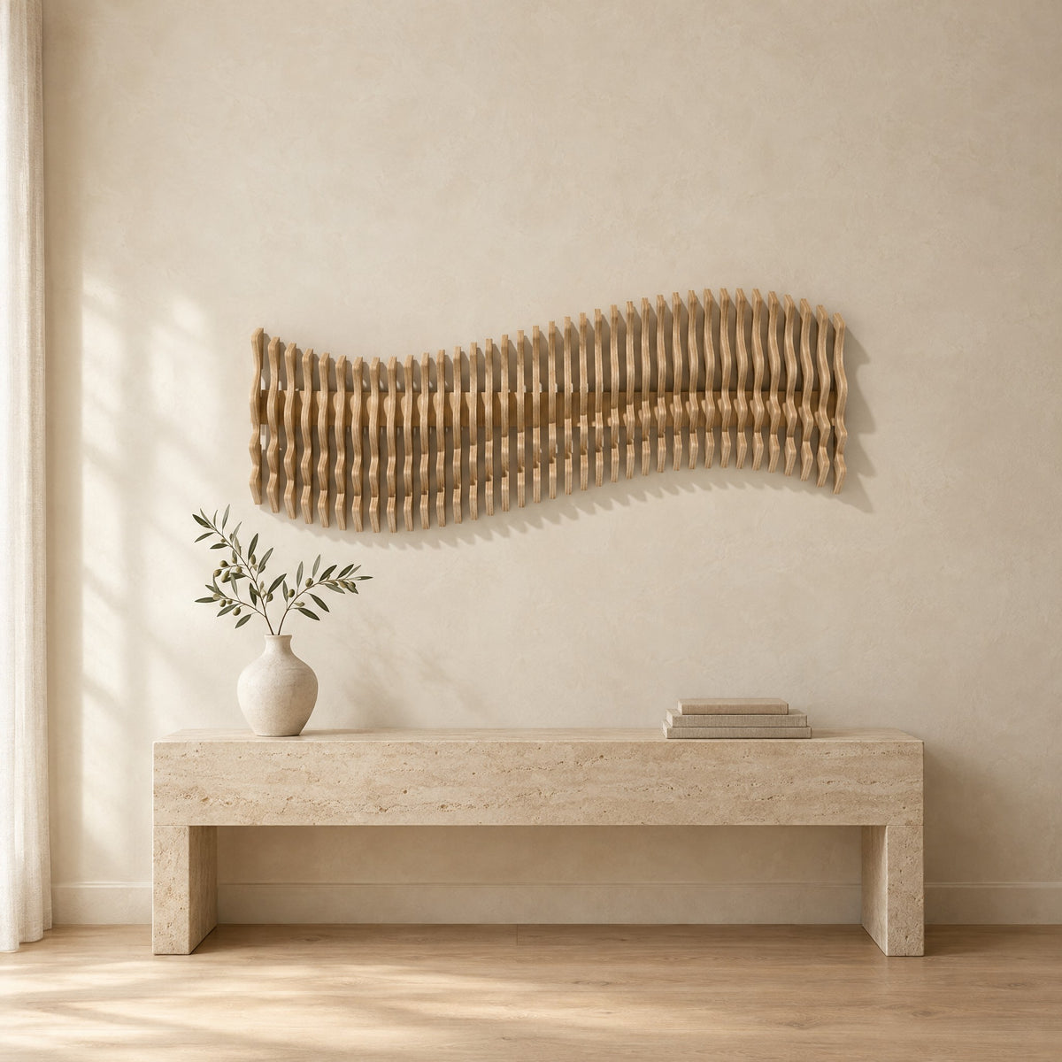 Meander in natural birch above a travertine console in an ivory limewash living room