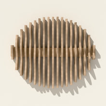 Orbit wall sculpture in natural birch