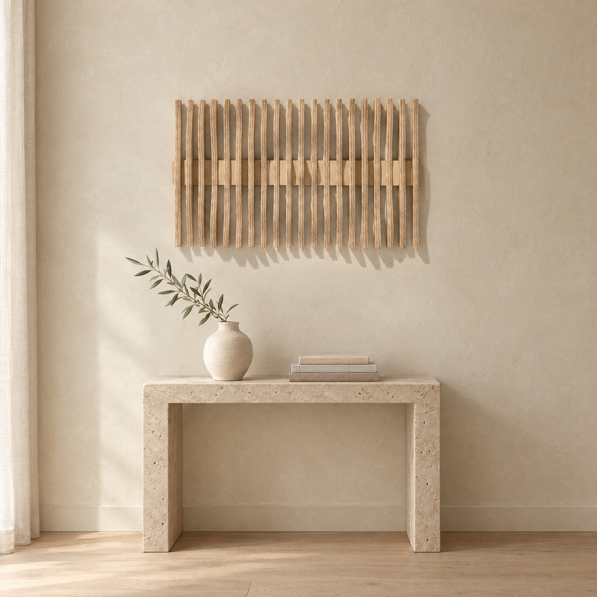 Resonance in natural birch above a travertine console in an ivory limewash living room